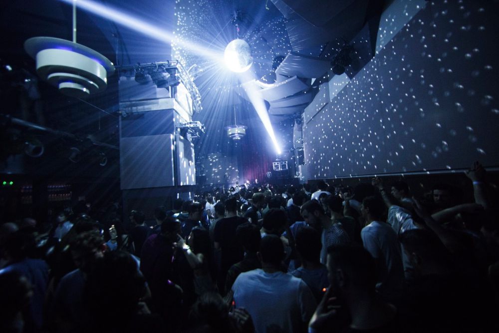 Ministerium Club Lisbon grand main room with high ceilings, ornate architecture, and dramatic lighting